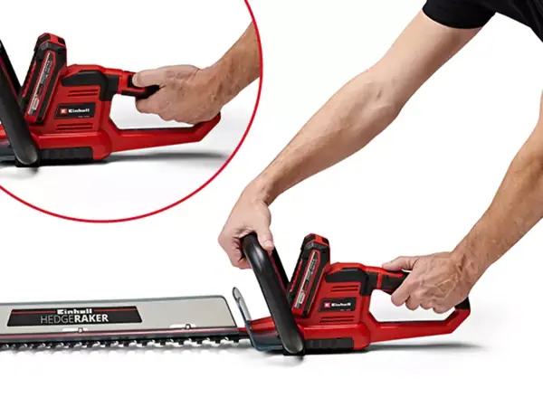 Akumulátorové nůžky na živý plot Einhell GE-CH 18/60 Li-Solo s otočnou zadní rukojetí, kterou drží obě ruce.