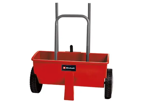 Rozmetadlo Einhell GC-SR 12 zezadu s pohledem na posypový mechanismus mezi koly.