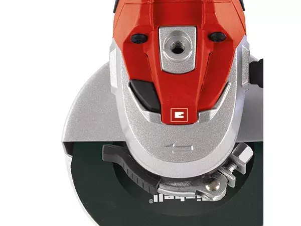 Úhlová bruska Einhell TE-AG 125/750 Kit shora s viditelným aretačním tlačítkem pro snadnou výměnu kotouče.