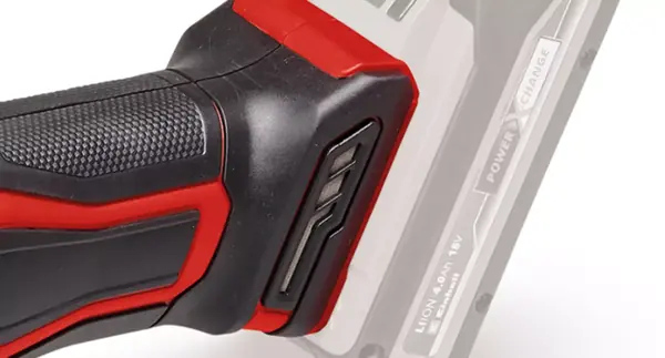 Seitenansicht eines Einhell Akku-Winkelschleifers mit Softgrip-Handgriff und integriertem Staubschutzgitter.