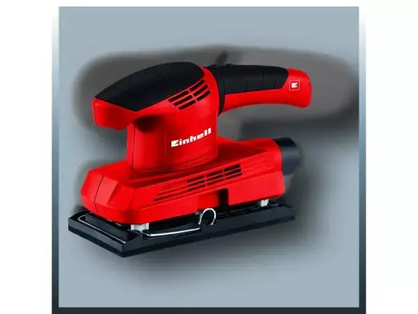 Vibrační bruska Einhell TC-OS 1520 v červeném pouzdře na šedém pozadí.