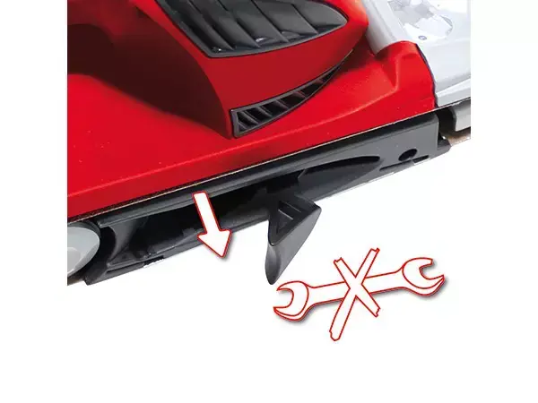 Beznástrojová výměna brusného pásu na pásové brusce Einhell TE-BS 8540 E s otevřenou pákou.